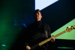 of New Order performing on stage at Budweiser Stage in Toronto, CANADA